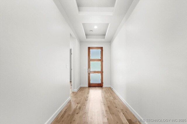 13242 E 4th Pl, Tulsa, OK 74108 - entryway featuring a tray ceiling, baseboards, and light wood-type flooring