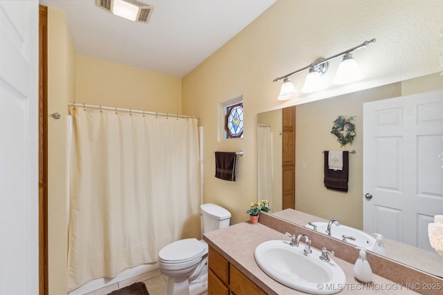 full bathroom featuring toilet, visible vents, a shower with shower curtain, tile patterned flooring, and vanity