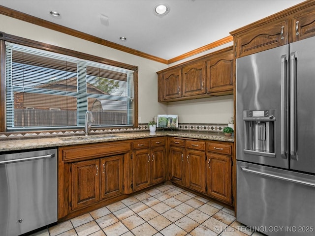 2600 Chapel Hill Rd, Bartlesville, OK 74006 - kitchen featuring appliances with stainless steel finishes, a sink, ornamental molding, light tile patterned floors, and recessed lighting