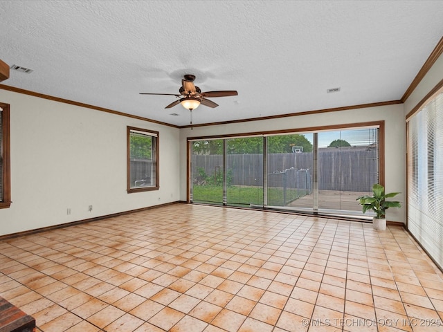 2600 Chapel Hill Rd, Bartlesville, OK 74006 - empty room with baseboards, a ceiling fan, light tile patterned floors, and a textured ceiling
