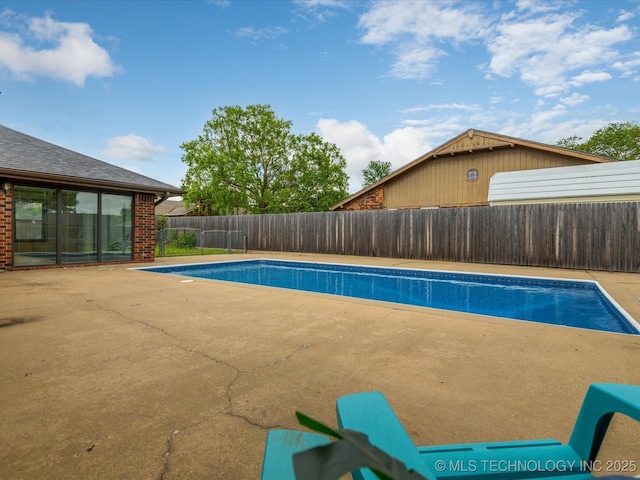 2600 Chapel Hill Rd, Bartlesville, OK 74006 - view of pool with a patio area and a fenced backyard