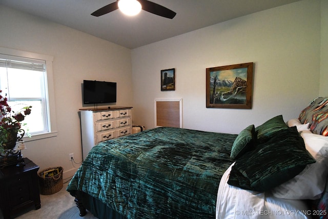 bedroom featuring carpet floors and a ceiling fan