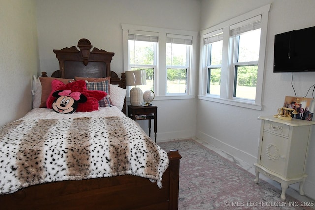 bedroom with baseboards