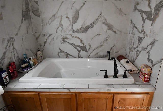 bathroom featuring a jetted tub