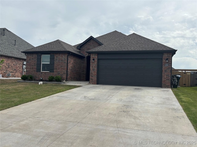 4242 W Village Park Dr, Skiatook, OK 74070 - ranch-style home featuring driveway, brick siding, and roof with shingles