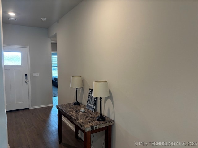 4242 W Village Park Dr, Skiatook, OK 74070 - foyer entrance featuring dark wood finished floors, visible vents, and baseboards