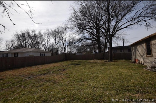 view of yard featuring fence