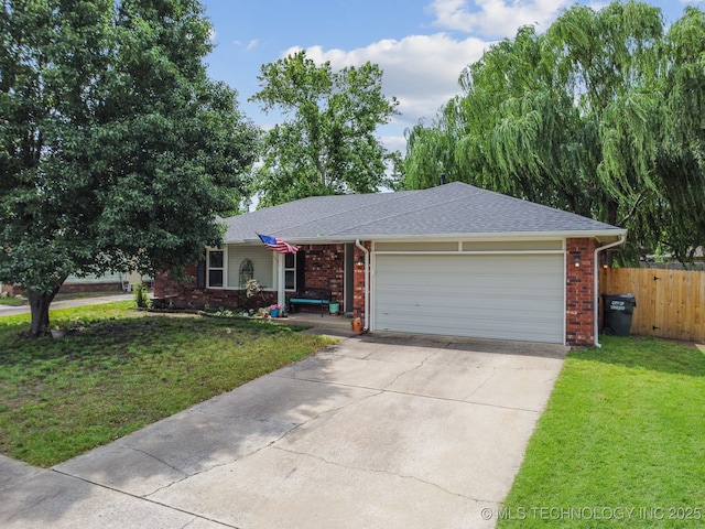 ranch-style home with driveway, brick siding, fence, an attached garage, and a front yard