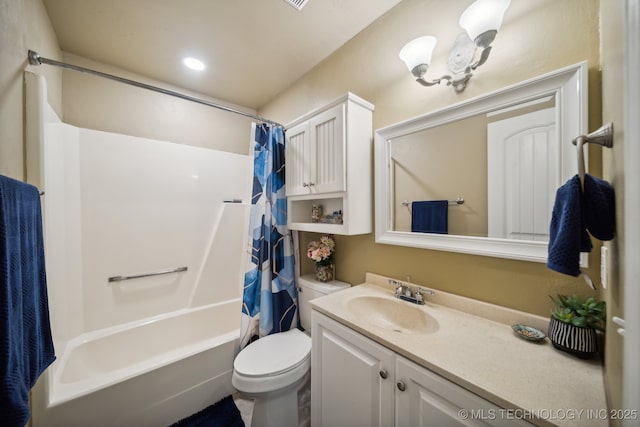 full bathroom featuring vanity, toilet, and shower / bath combination with curtain