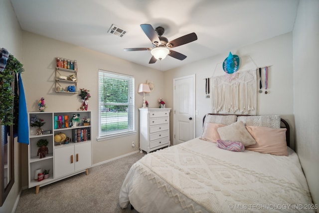 bedroom with carpet floors, baseboards, and a ceiling fan