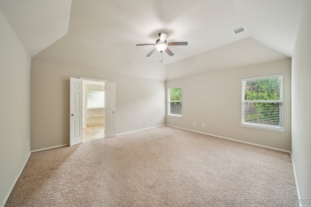 4712 N Narcissus Ave, Broken Arrow, OK 74012 - empty room with lofted ceiling, ceiling fan, light carpet, and baseboards