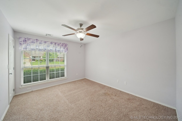 4712 N Narcissus Ave, Broken Arrow, OK 74012 - carpeted spare room featuring a ceiling fan and baseboards