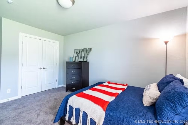 6442 E 148th St S, Bixby, OK 74008 - bedroom with a closet, baseboards, and carpet floors