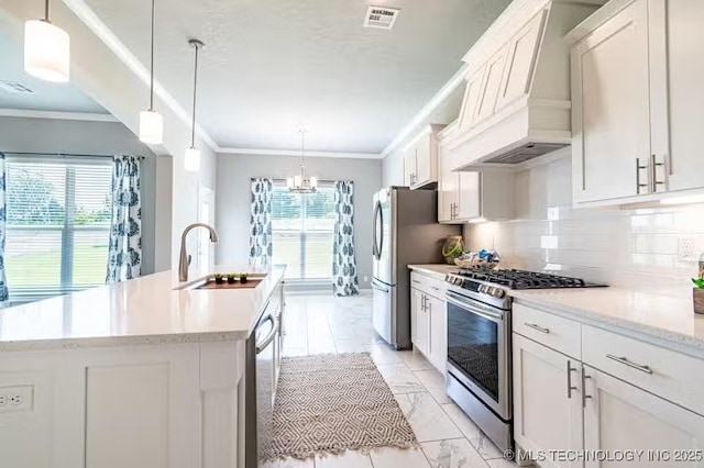 6442 E 148th St S, Bixby, OK 74008 - kitchen featuring a sink, stainless steel appliances, visible vents, a chandelier, and custom range hood