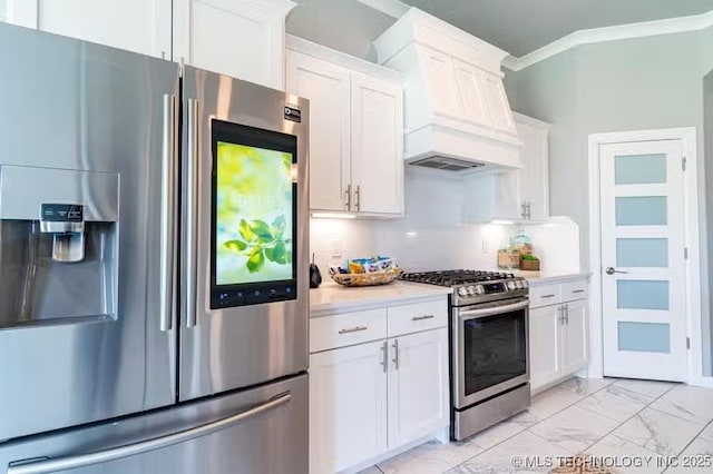 6442 E 148th St S, Bixby, OK 74008 - kitchen with stainless steel appliances, marble finish floor, custom range hood, white cabinetry, and light countertops