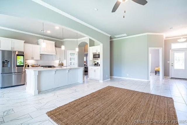 6442 E 148th St S, Bixby, OK 74008 - kitchen with stainless steel appliances, marble finish floor, crown molding, custom exhaust hood, and white cabinets