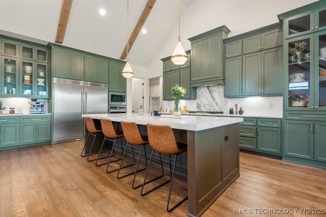 16804 E 43rd St S, Tulsa, OK 74134 - kitchen with built in appliances, high vaulted ceiling, decorative backsplash, green cabinetry, and beamed ceiling