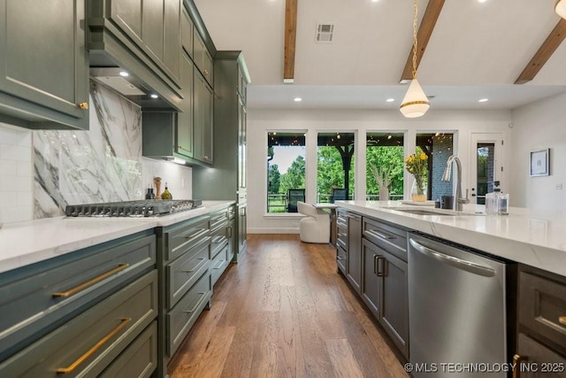 16804 E 43rd St S, Tulsa, OK 74134 - kitchen featuring a sink, stainless steel appliances, visible vents, dark wood-type flooring, and tasteful backsplash