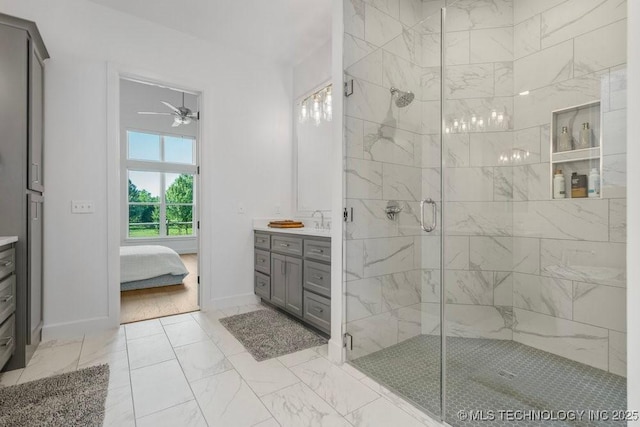 16804 E 43rd St S, Tulsa, OK 74134 - bathroom featuring a ceiling fan, a stall shower, ensuite bath, marble finish floor, and vanity