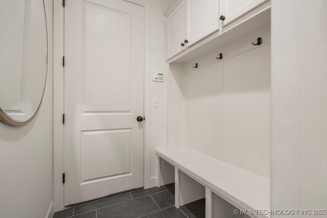 16804 E 43rd St S, Tulsa, OK 74134 - mudroom featuring dark tile patterned floors