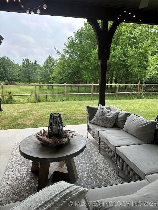 16804 E 43rd St S, Tulsa, OK 74134 - view of patio with an outdoor living space and a fenced backyard