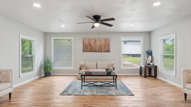 4010 E Harris, Muskogee, OK 74403 - living area with ceiling fan, recessed lighting, baseboards, and wood finished floors