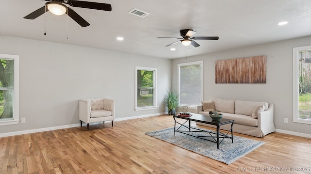 4010 E Harris, Muskogee, OK 74403 - living room featuring ceiling fan, baseboards, plenty of natural light, and wood finished floors