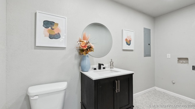 4010 E Harris, Muskogee, OK 74403 - bathroom featuring electric panel, toilet, baseboards, and vanity