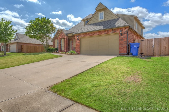traditional home with roof with shingles, brick siding, a garage, and fence