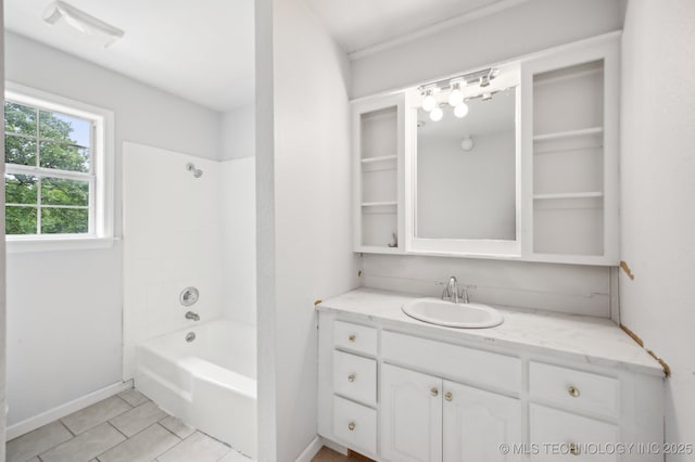 1109 S Division St, Sapulpa, OK 74066 - full bathroom with bathing tub / shower combination, tile patterned floors, visible vents, baseboards, and vanity
