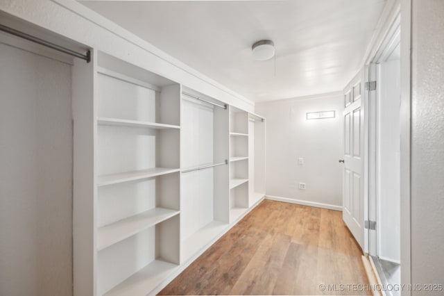 1109 S Division St, Sapulpa, OK 74066 - spacious closet featuring light wood-type flooring