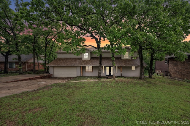 1109 S Division St, Sapulpa, OK 74066 - view of front of property with concrete driveway, french doors, and a front lawn