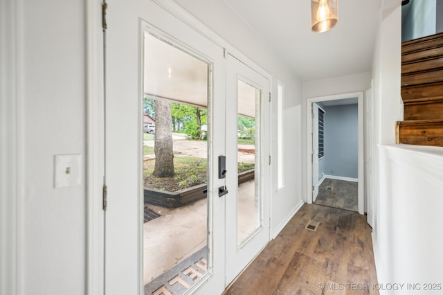1109 S Division St, Sapulpa, OK 74066 - doorway to outside with visible vents, french doors, baseboards, and dark wood-style floors