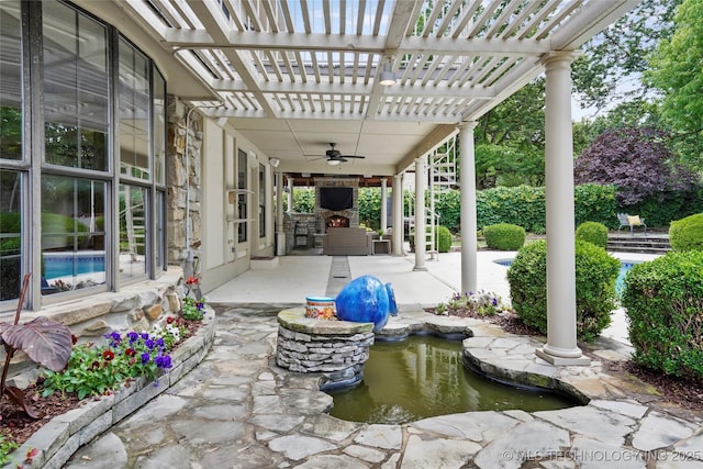 view of patio / terrace featuring a ceiling fan, an outdoor hangout area, a garden pond, and a pergola