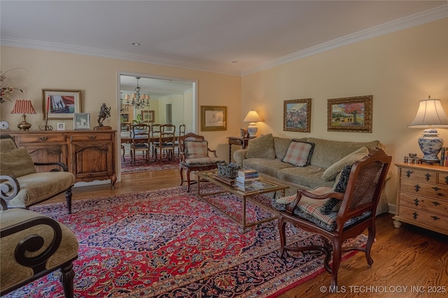 3421 E 62nd St, Tulsa, OK 74136 - living area featuring wood finished floors, ornamental molding, and a chandelier