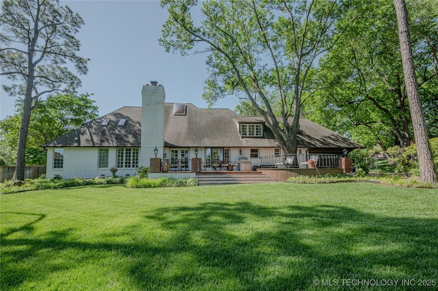 3421 E 62nd St, Tulsa, OK 74136 - rear view of house featuring a wooden deck, french doors, and a chimney
