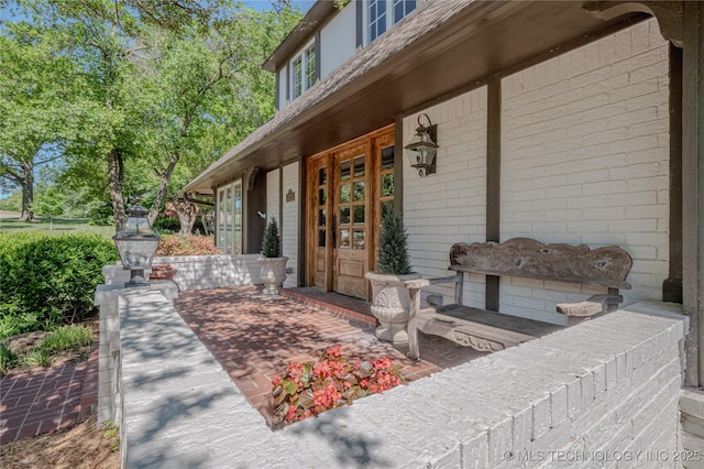3421 E 62nd St, Tulsa, OK 74136 - doorway to property featuring a porch