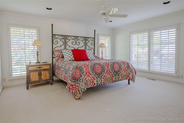 3421 E 62nd St, Tulsa, OK 74136 - carpeted bedroom with ornamental molding and a ceiling fan