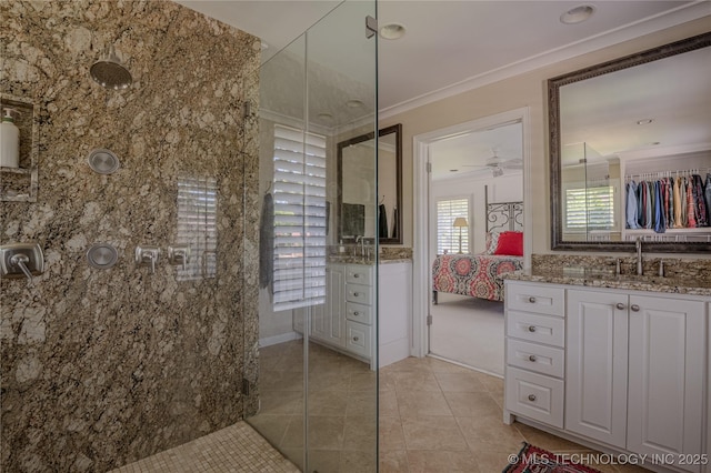 3421 E 62nd St, Tulsa, OK 74136 - full bath featuring crown molding, ensuite bathroom, tiled shower, tile patterned floors, and vanity