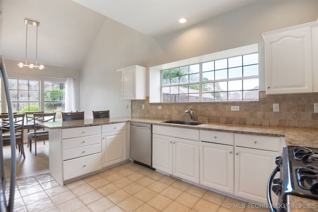 kitchen featuring a sink, range with gas cooktop, white cabinetry, stainless steel dishwasher, and backsplash