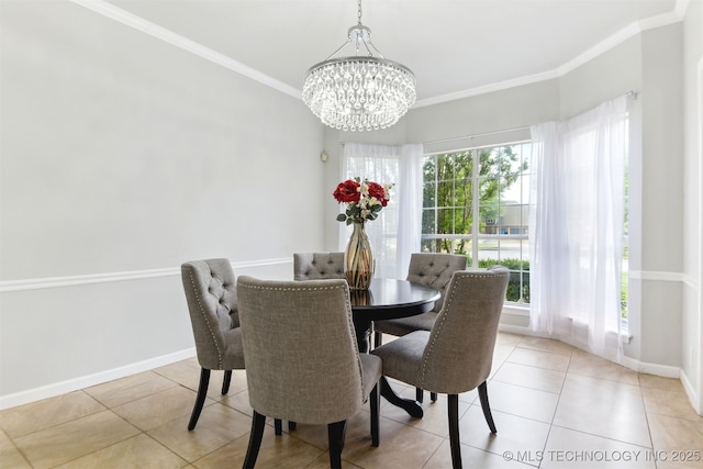 dining room featuring a healthy amount of sunlight, crown molding, a notable chandelier, and light tile patterned floors