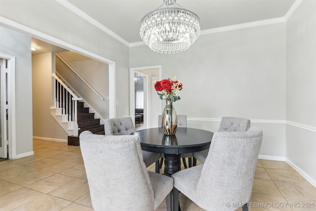 dining area featuring light tile patterned floors, baseboards, ornamental molding, stairs, and a chandelier