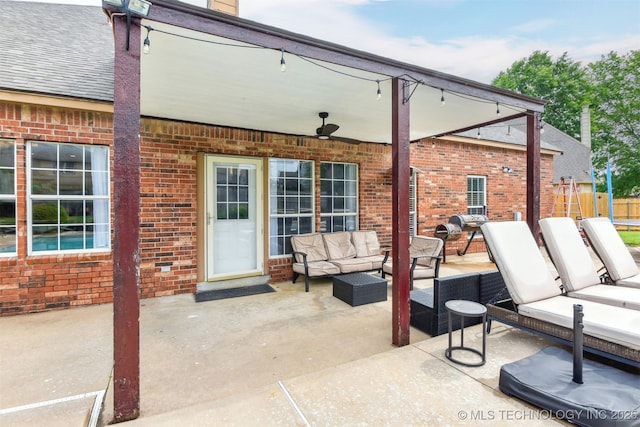 view of patio / terrace featuring an outdoor hangout area, ceiling fan, and fence