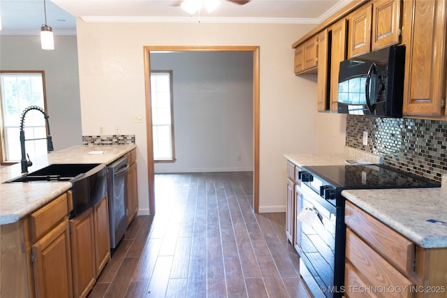 kitchen featuring light countertops, stainless steel appliances, decorative backsplash, and dark wood-type flooring
