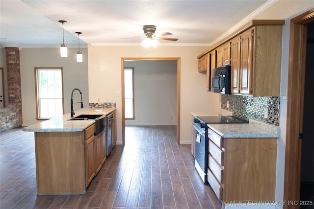 kitchen with light stone countertops, ceiling fan, a peninsula, decorative backsplash, and stainless steel appliances
