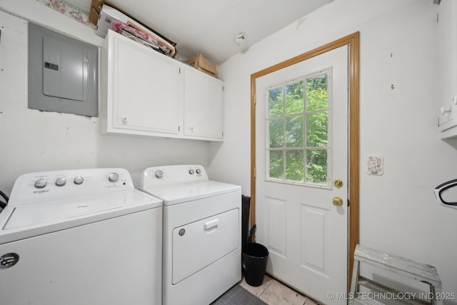 141 S Bryan St, Copan, OK 74022 - laundry area featuring electric panel, separate washer and dryer, light tile patterned flooring, and cabinet space