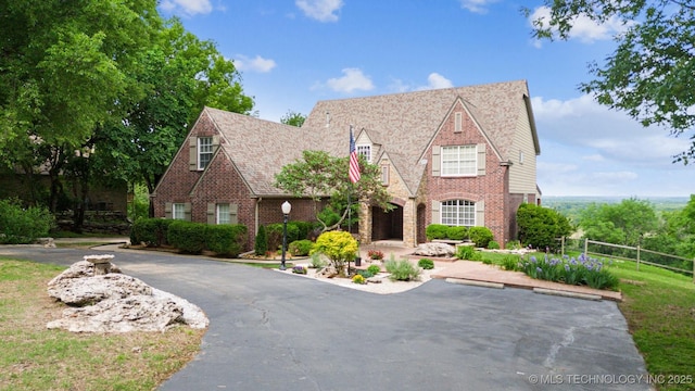 tudor house with brick siding