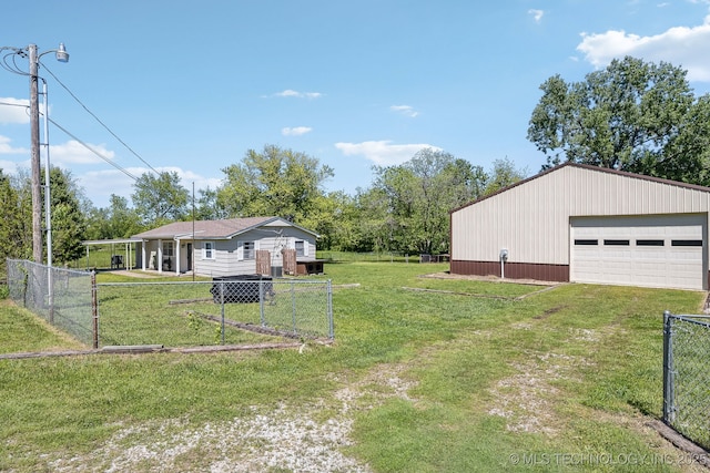 9553 W 71st St S, Tulsa, OK 74131 - view of yard with fence, a garage, and an outbuilding