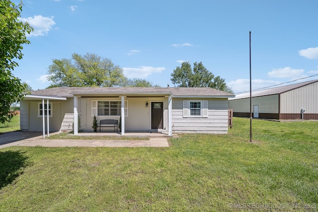 9553 W 71st St S, Tulsa, OK 74131 - ranch-style house with a front yard and covered porch