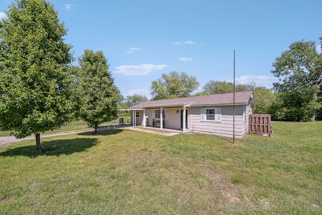 9553 W 71st St S, Tulsa, OK 74131 - back of property with a yard and a patio area